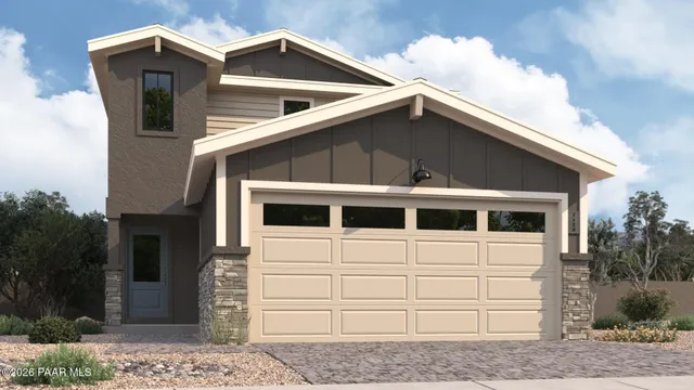 a view of a house with a garage