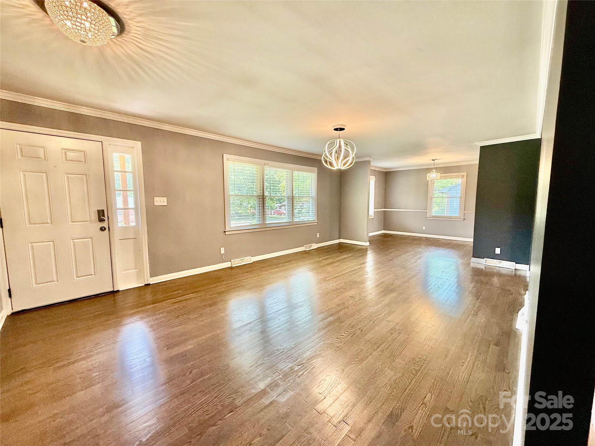 622 University Drive Rock Hill, SC 29730 - Photo 11 of 24 a view of empty room with wooden floor and fan
