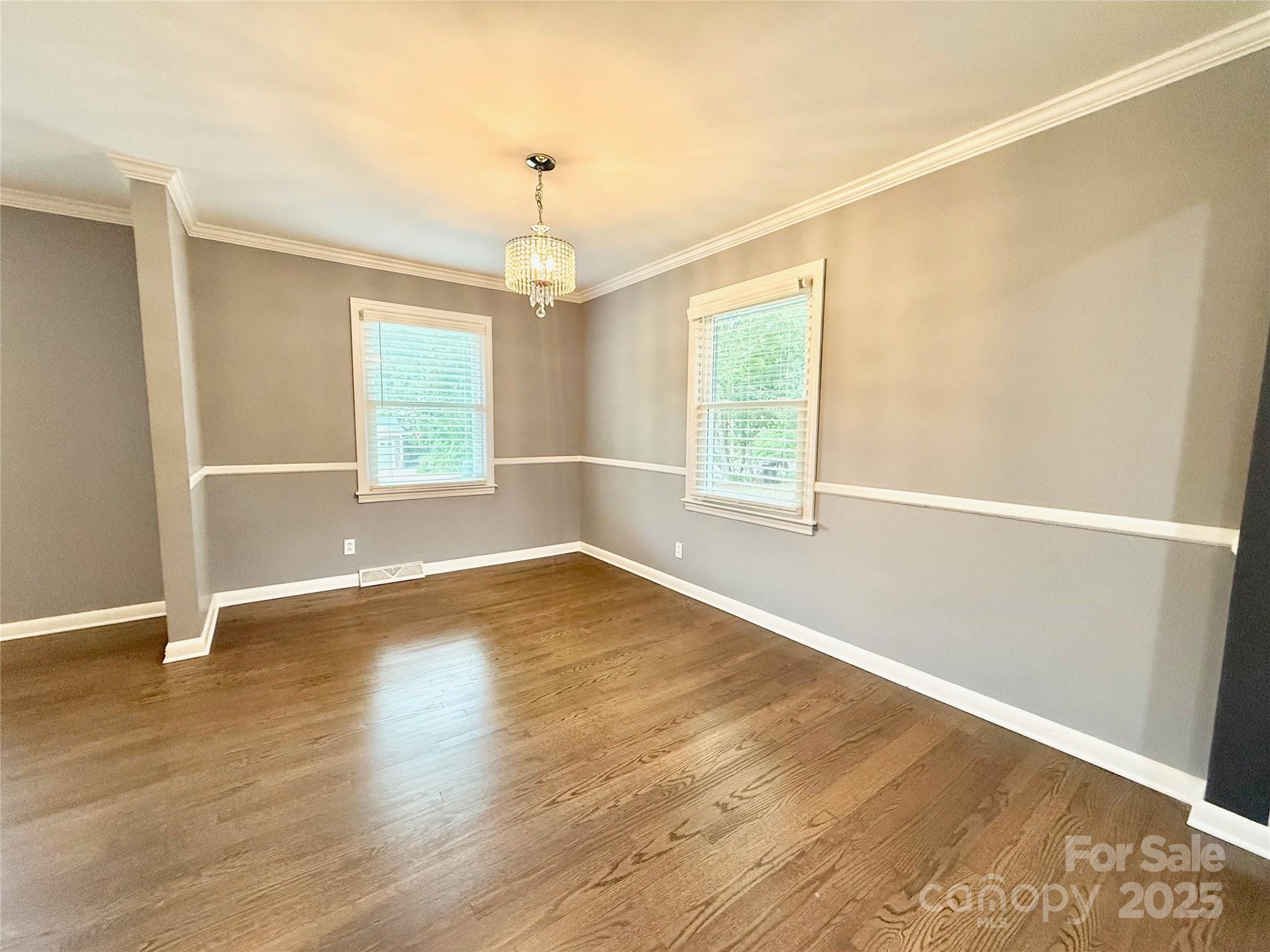 622 University Drive Rock Hill, SC 29730 - Photo 12 of 24 an empty room with wooden floor and windows