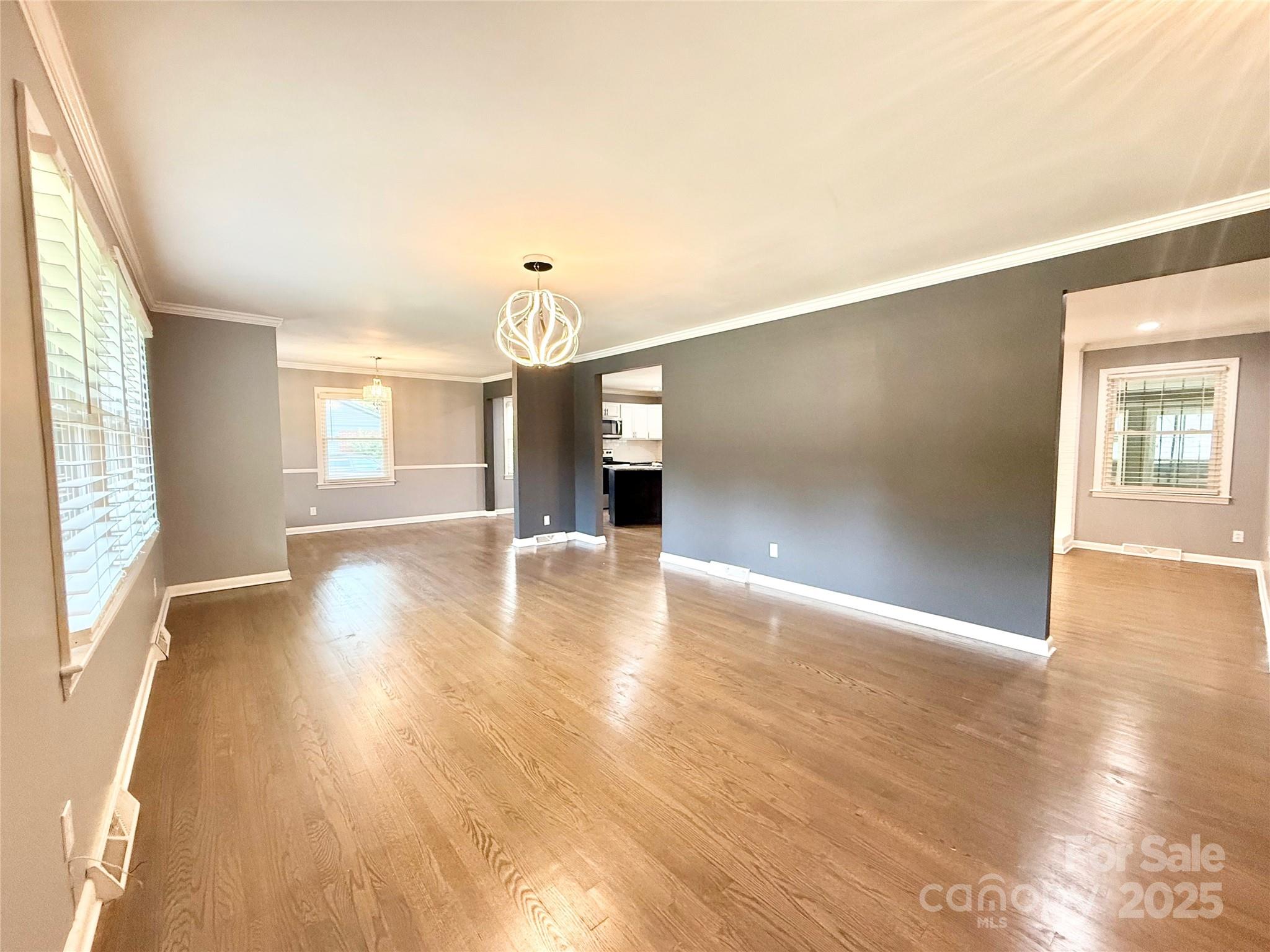 622 University Drive Rock Hill, SC 29730 - Photo 13 of 24 an empty room with wooden floor and windows