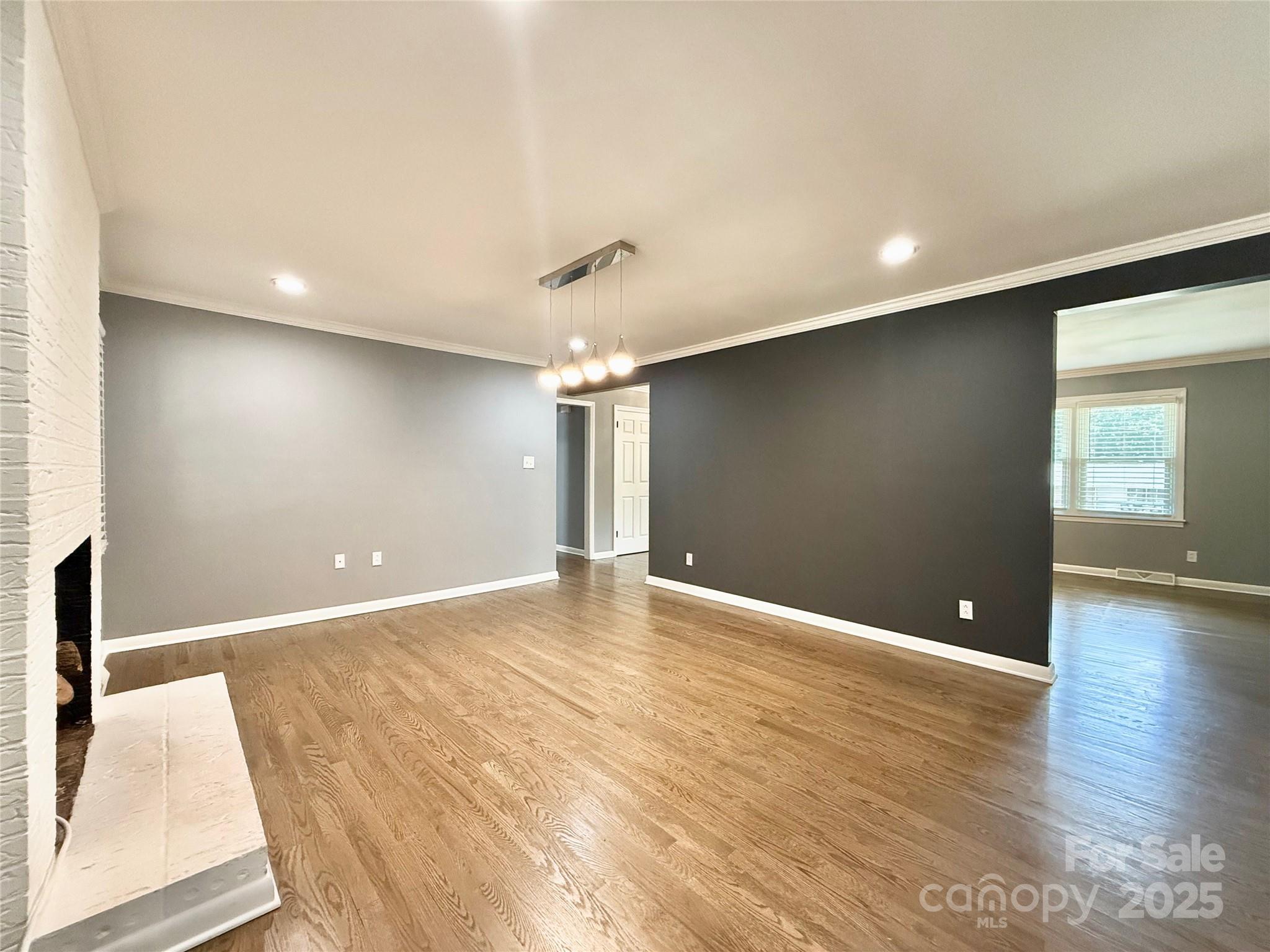 622 University Drive Rock Hill, SC 29730 - Photo 18 of 24 a view of an empty room with wooden floor