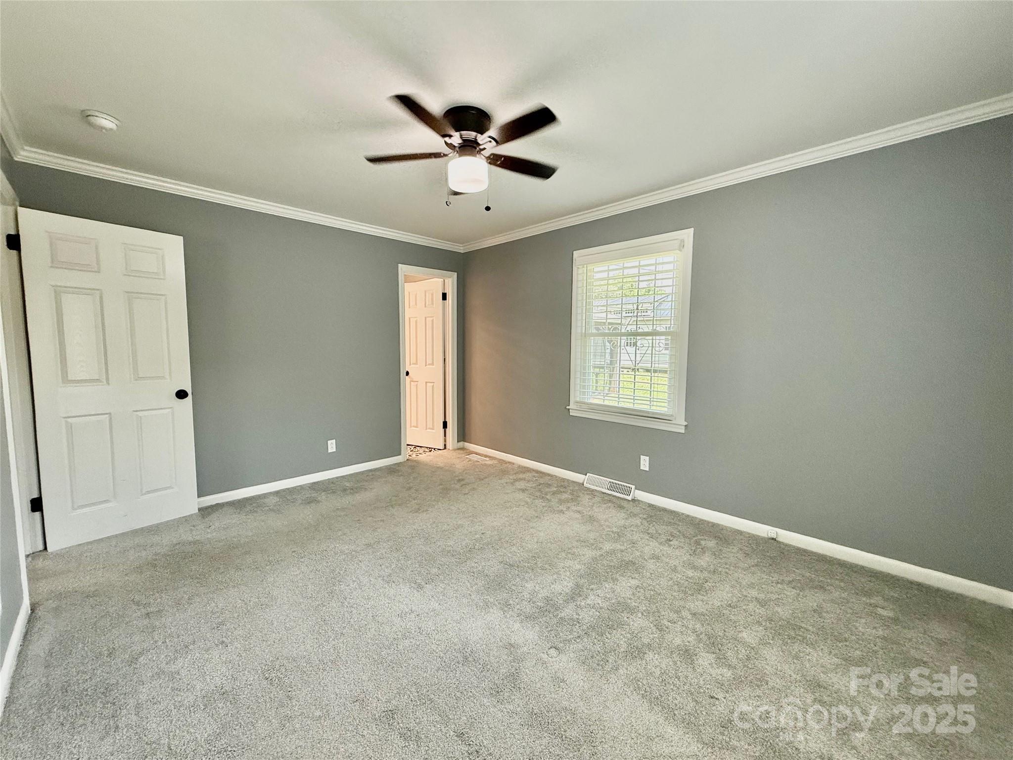 622 University Drive Rock Hill, SC 29730 - Photo 20 of 24 an empty room with windows and fan