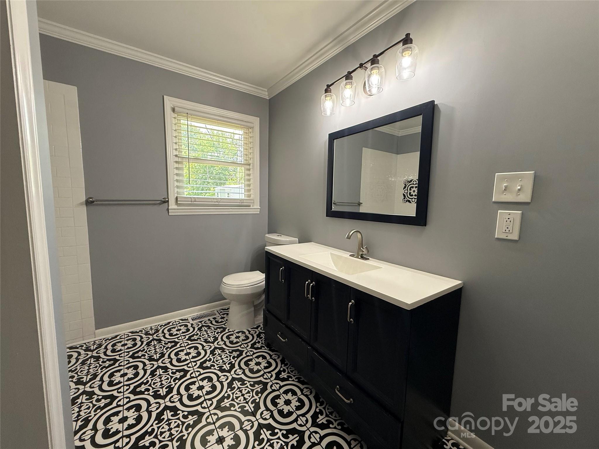 622 University Drive Rock Hill, SC 29730 - Photo 23 of 24 a bathroom with a sink and a mirror
