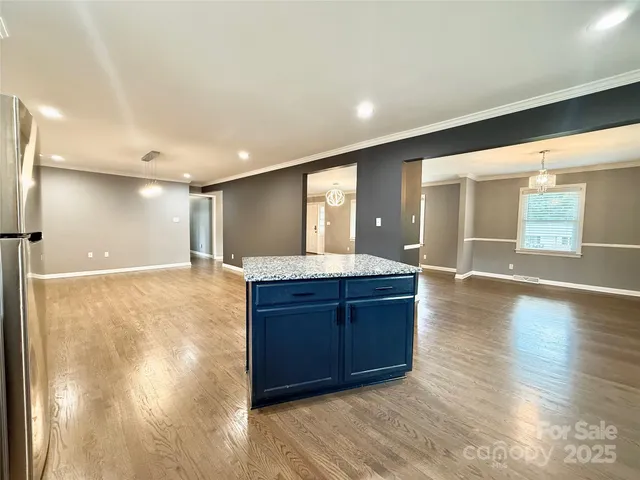 a bathroom with a sink and a large mirror