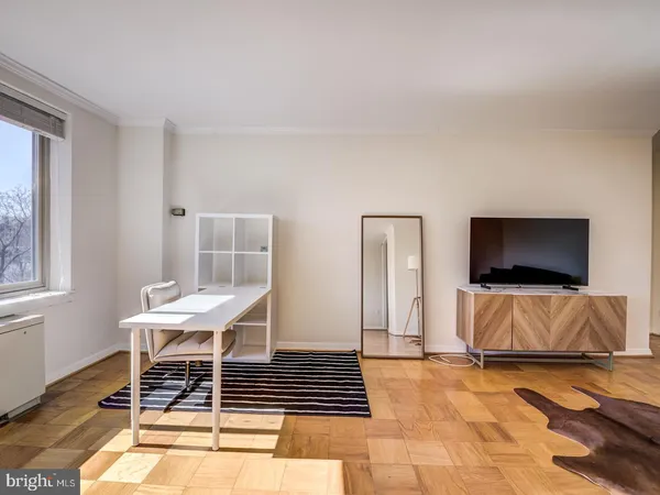 a view of livingroom with furniture and window