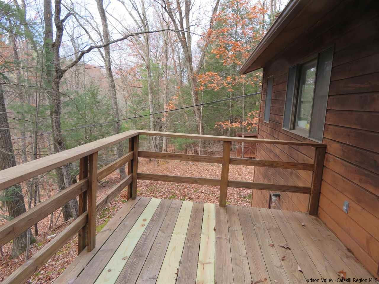 231 Beaverkill Road Kingston, NY 12401 - Photo 3 of 32 a view of balcony with wooden floor and fence