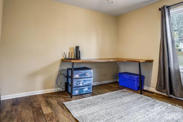 a view of livingroom with furniture and window