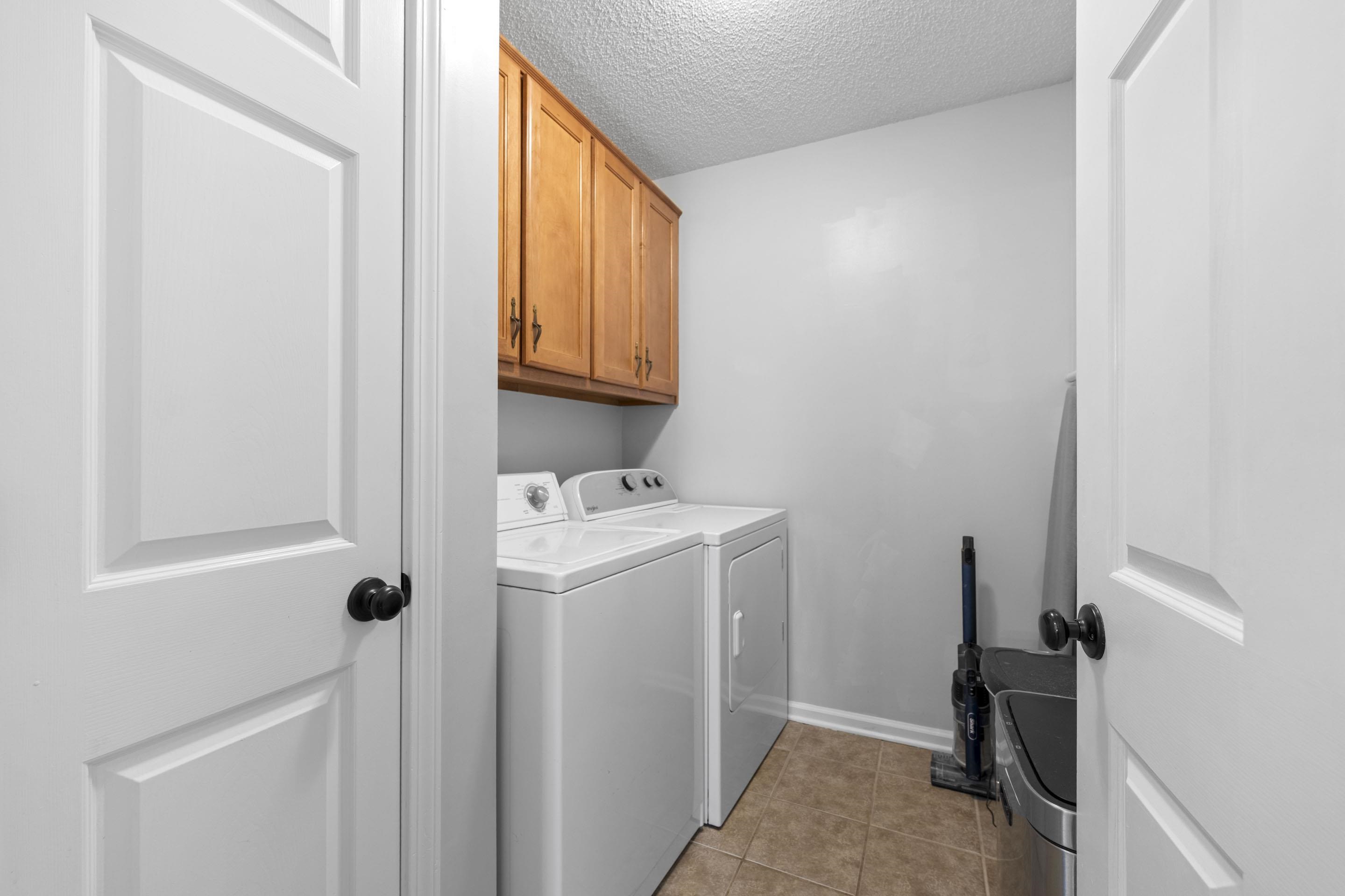 364 Rose Trellis Road Collierville, TN 38017 - Photo 15 of 28 a utility room with a window dryer and washer