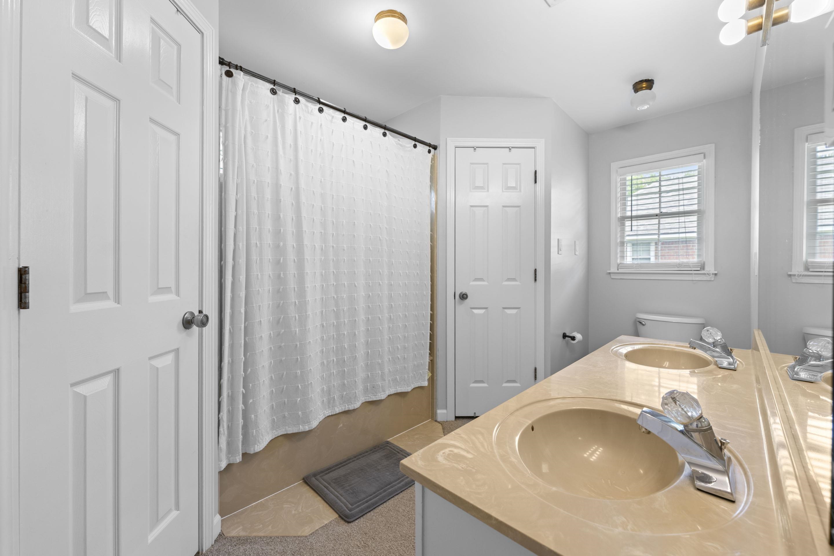 364 Rose Trellis Road Collierville, TN 38017 - Photo 19 of 28 a bathroom with a sink and a mirror