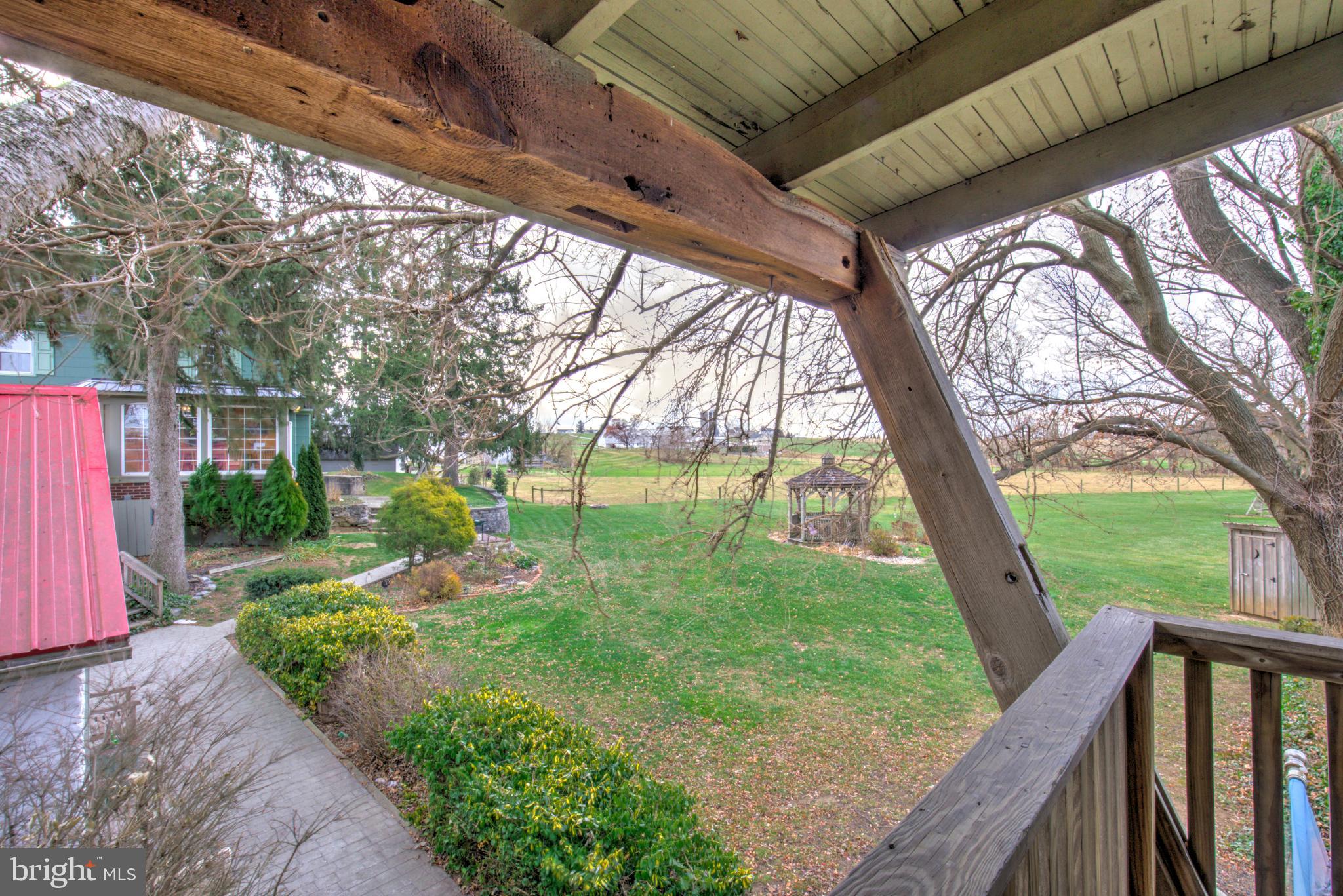 44 Frogtown Road Paradise, PA 17562 - Photo 82 of 86 Serene garden view from a cozy balcony.