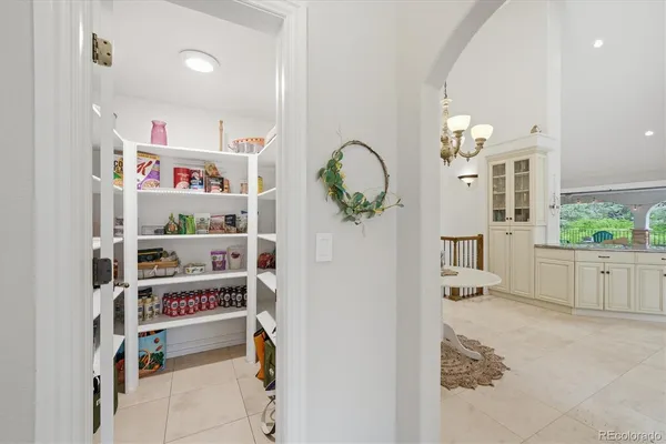 a room with furniture and a book shelf
