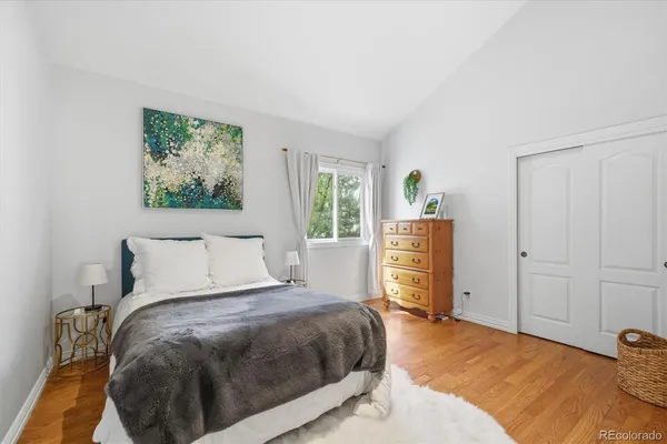 a bedroom with a bed and a cabinets