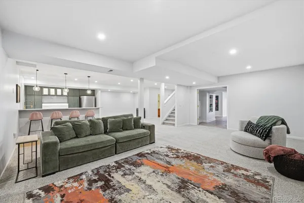 a living room with furniture and a couch