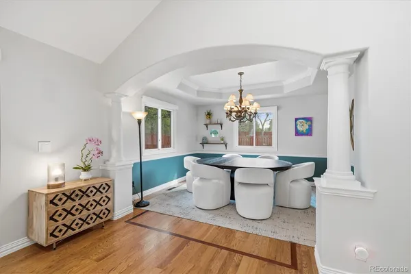 a spacious bathroom with a sink and a mirror