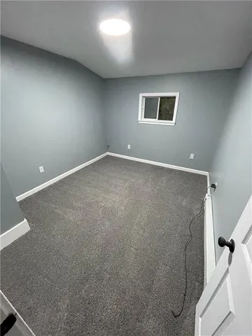 an empty room with a workbench