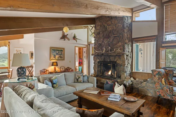 a view of a workspace with furniture and toys