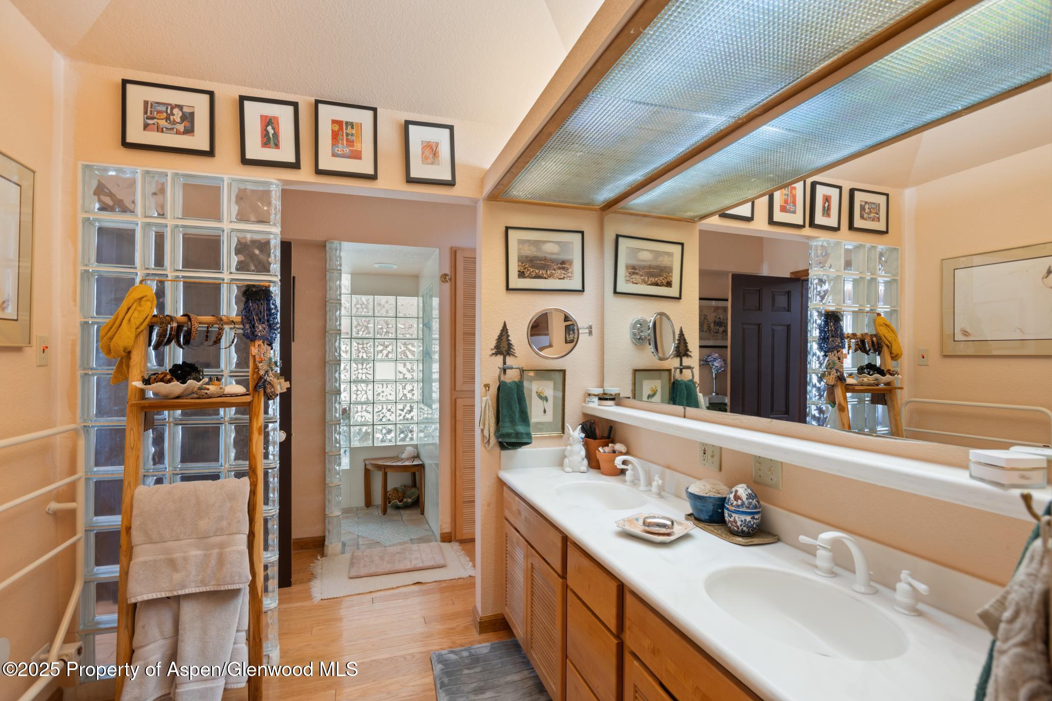 4440 County Road 342 Silt, CO 81652 - Photo 18 of 62 a bathroom with a sink double vanity and a mirror