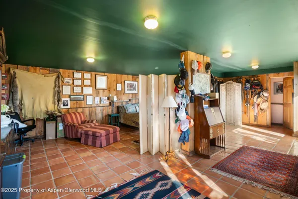 a front view of a house with outdoor seating