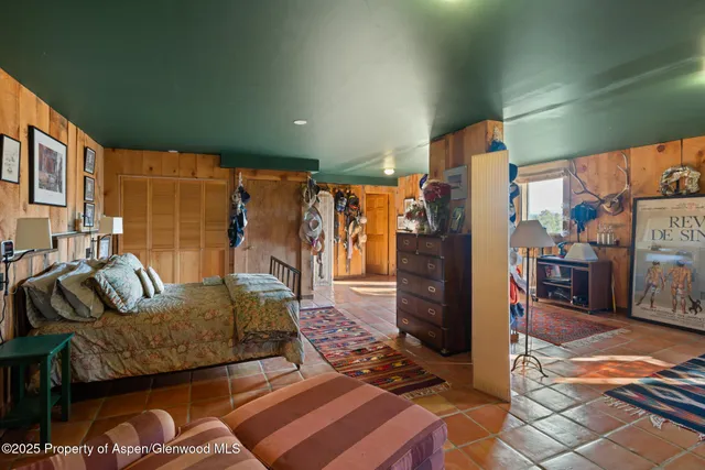 a view of a car is parked in garage