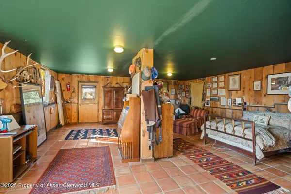 a view of swimming pool with an outdoor seating and a yard