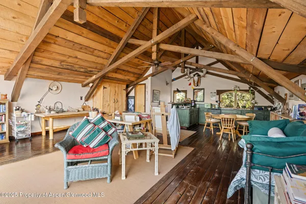 a view of a house with a yard and garage