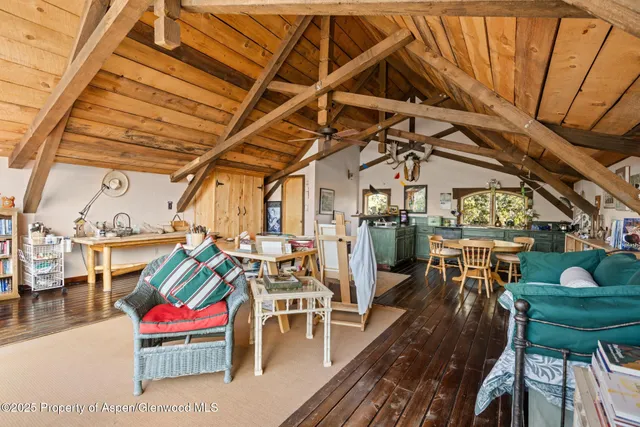a view of a house with a yard and garage