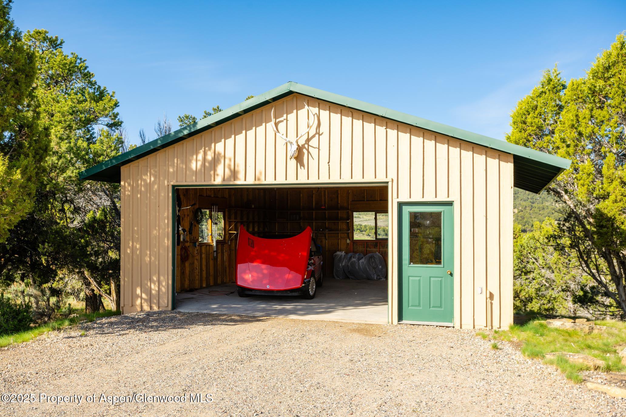 4440 County Road 342 Silt, CO 81652 - Photo 53 of 62 a front view of a house with outdoor seating