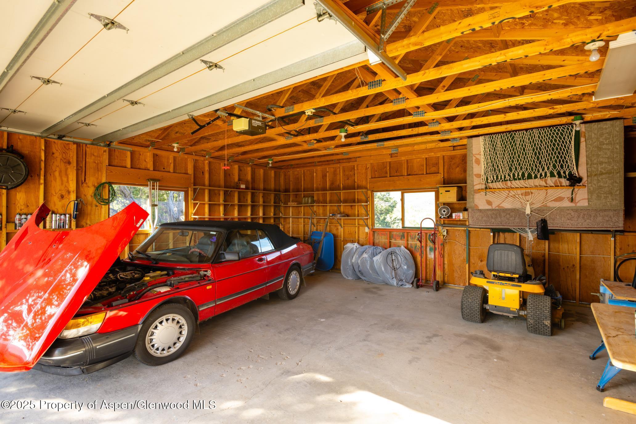 4440 County Road 342 Silt, CO 81652 - Photo 54 of 62 a view of a car is parked in garage