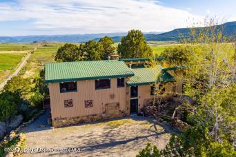 4440 County Road 342 Silt, CO 81652 - Photo 56 of 62 a view of a house with a yard