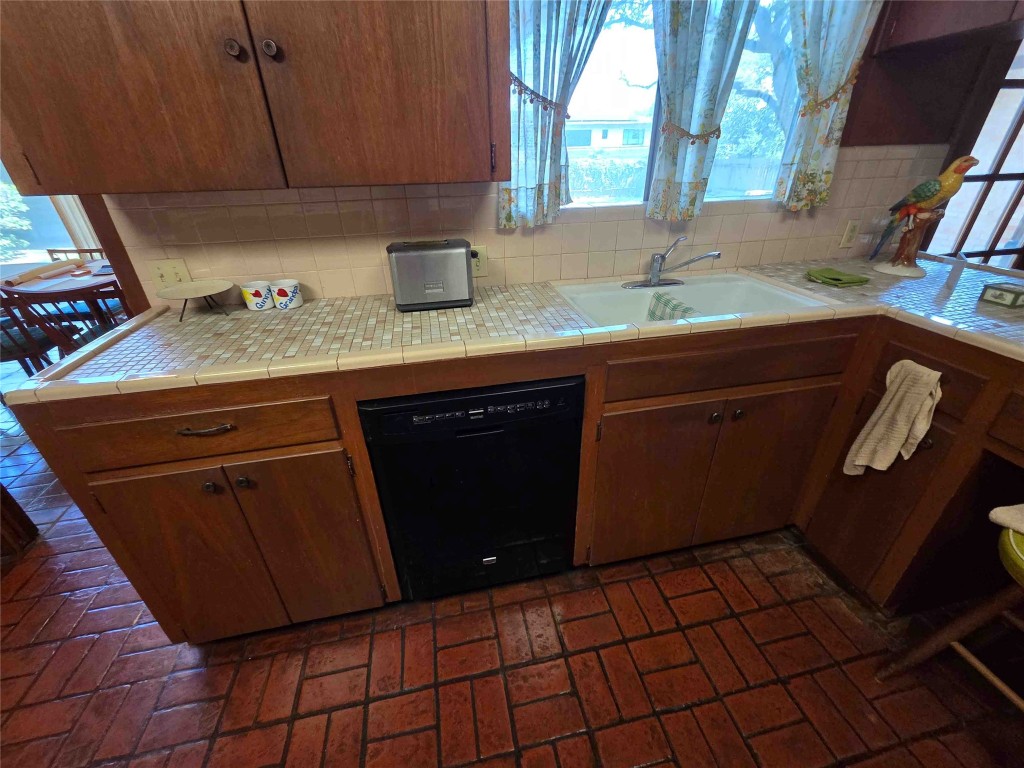 402 Honeycomb Ridge Austin, TX 78746 - Photo 25 of 40 a close view of sink and cabinets