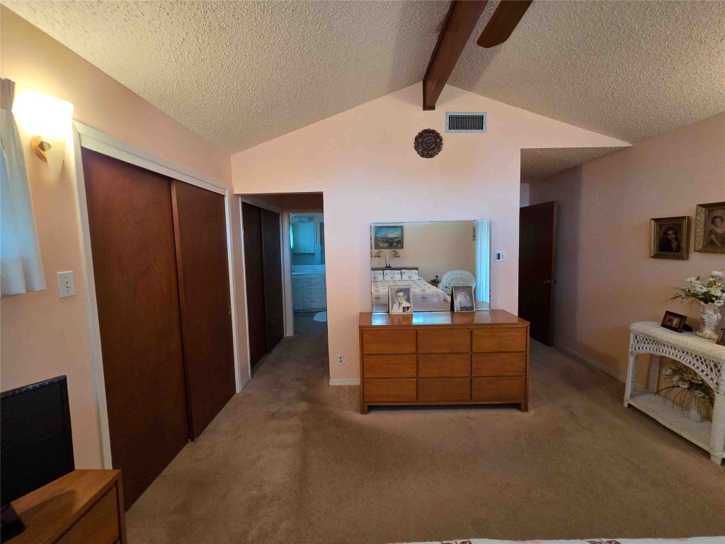 402 Honeycomb Ridge Austin, TX 78746 - Photo 29 of 40 a living room with furniture and a flat screen tv
