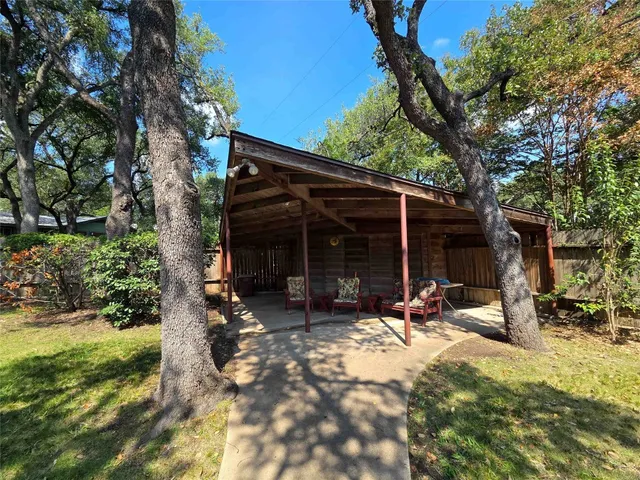 a view of a patio with a chairs in a patio