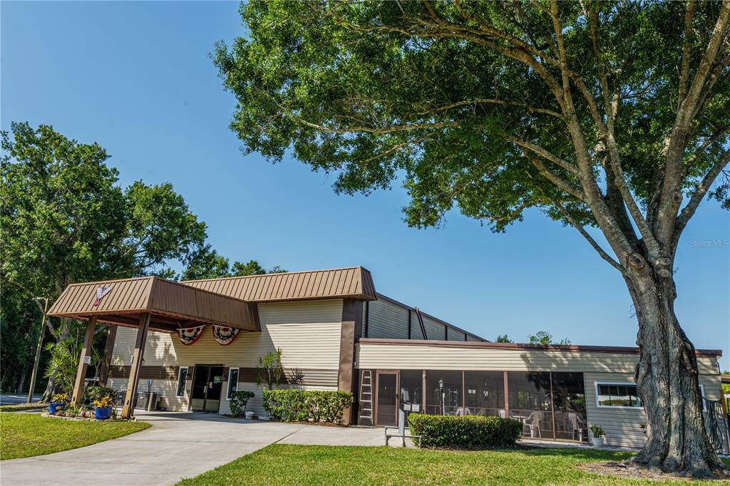 2527 Longpine Lane St. Cloud, FL 34772 - Photo 27 of 42 a front view of a house with garden
