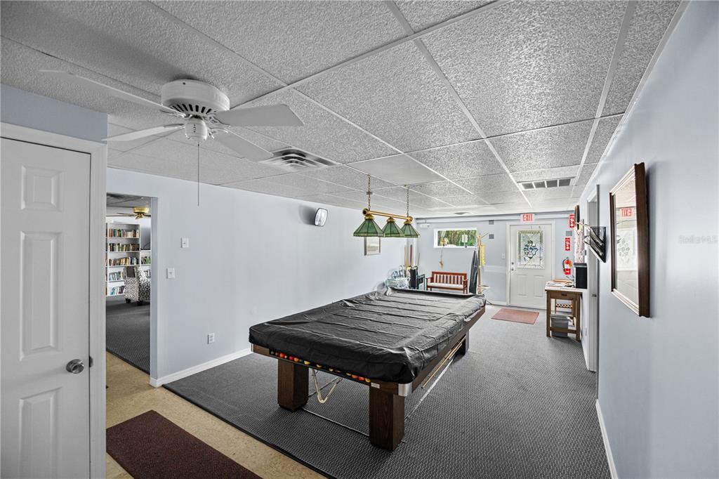 2527 Longpine Lane St. Cloud, FL 34772 - Photo 33 of 42 a view of wooden floor and windows in a room