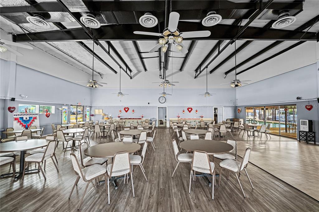 2527 Longpine Lane St. Cloud, FL 34772 - Photo 36 of 42 a view of a dining room with furniture and wooden floor