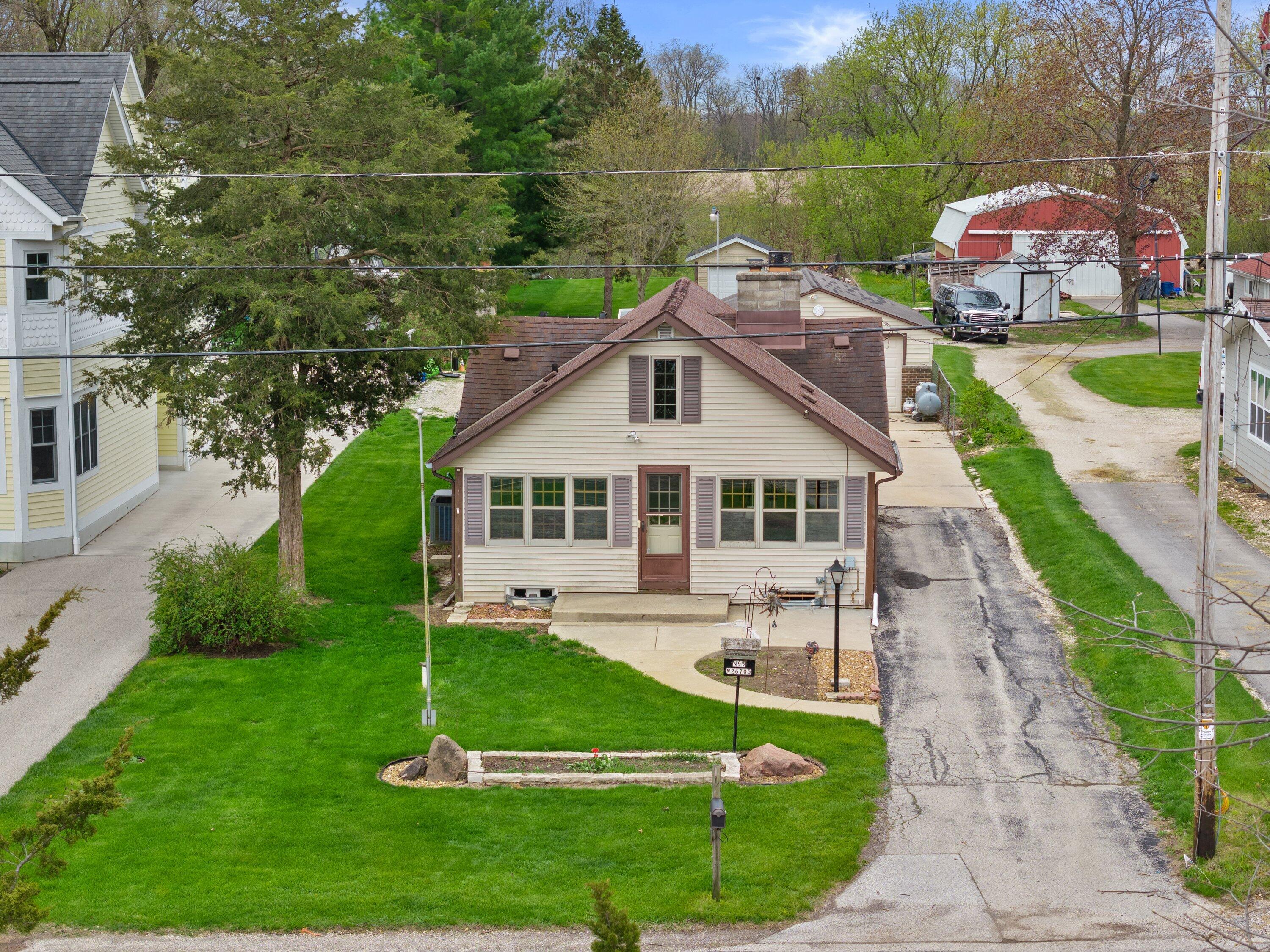 N95-w26705 County Rd Q Hartland, WI 53029 - Photo 36 of 55 DJI_20260430145732_0454_D