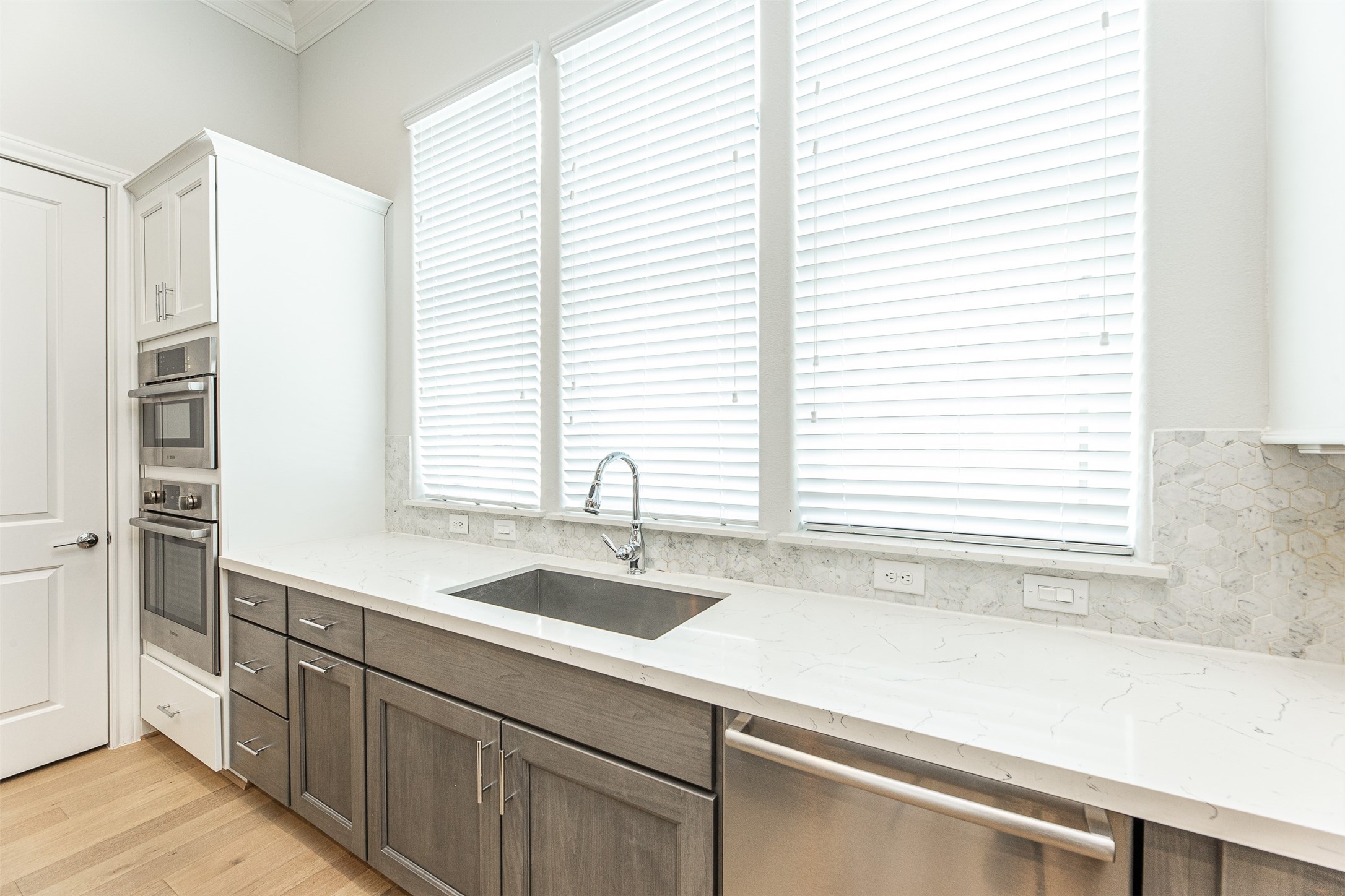 2028 Waterloo Station Road Houston, TX 77045 - Photo 18 of 34 a kitchen with a sink and a window