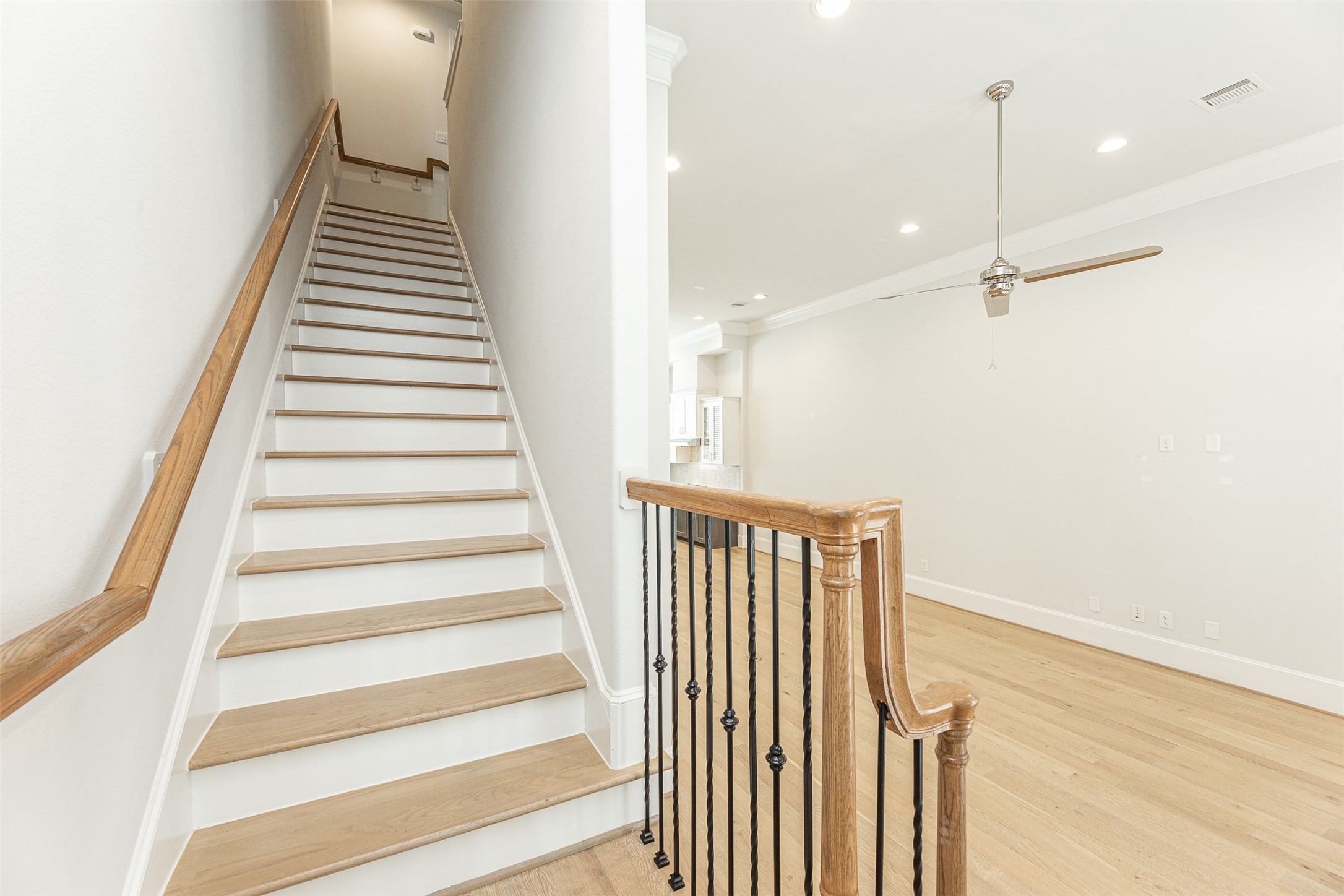 2028 Waterloo Station Road Houston, TX 77045 - Photo 21 of 34 a view of a hallway with staircase