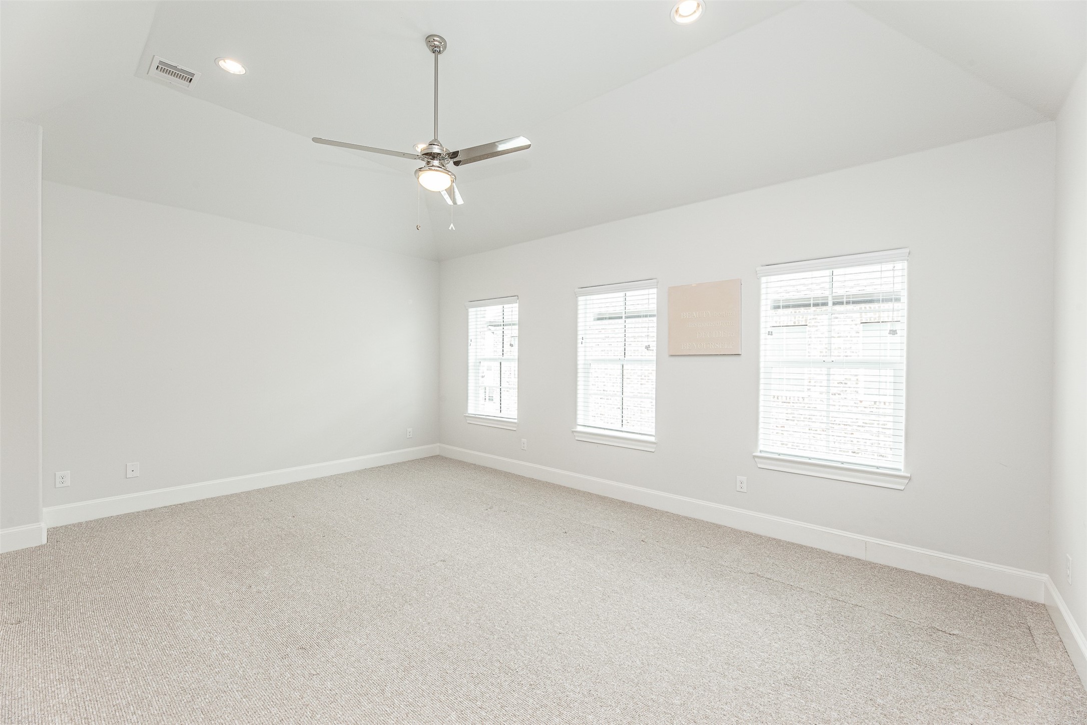 2028 Waterloo Station Road Houston, TX 77045 - Photo 25 of 34 an empty room with a window and ceiling fan