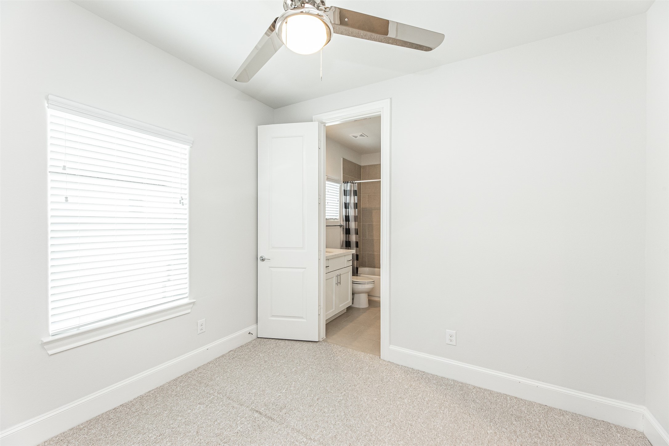 2028 Waterloo Station Road Houston, TX 77045 - Photo 31 of 34 a view of an empty room with a window