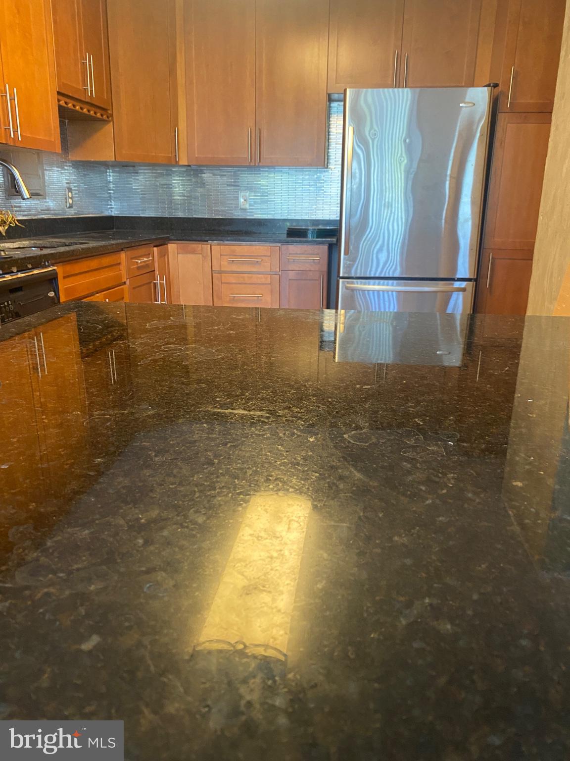 1836 Metzerott Road, Unit 707 Hyattsville, MD 20783 - Photo 7 of 13 Sleek kitchen with modern finishes.