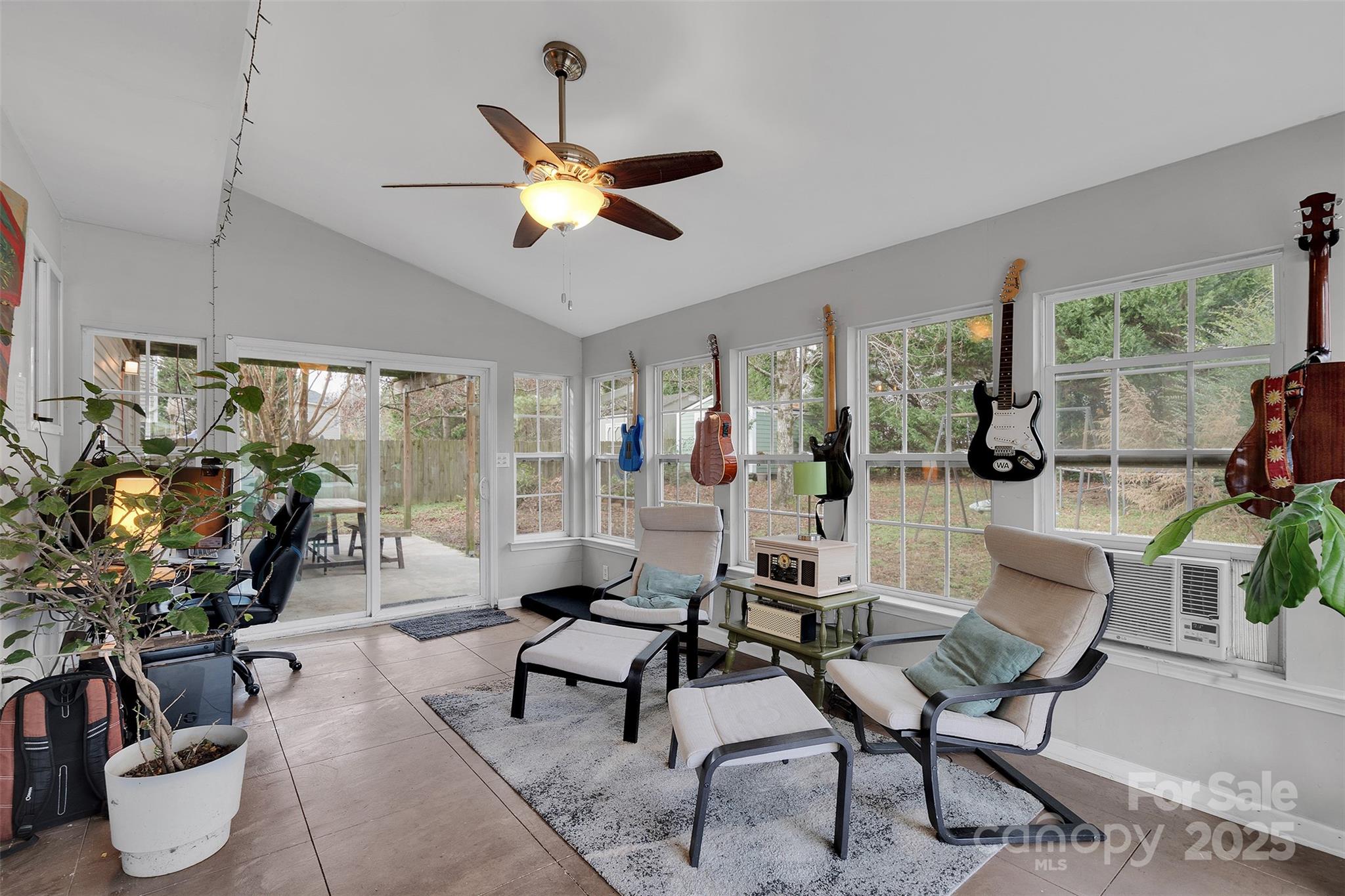 3007 Wyntree Court Matthews, NC 28104 - Photo 16 of 44 a living room with furniture and a large window