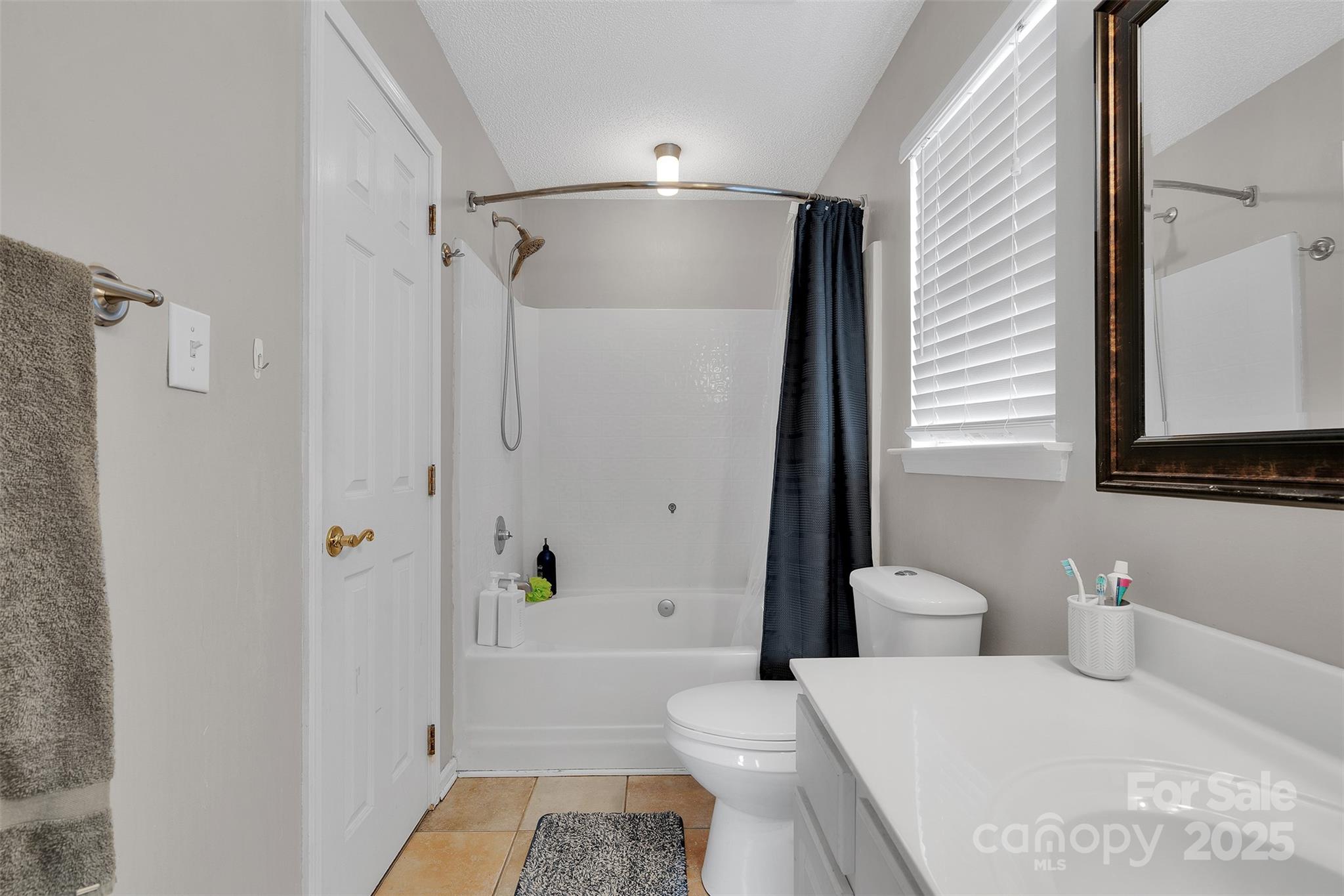 3007 Wyntree Court Matthews, NC 28104 - Photo 34 of 44 a bathroom with a toilet and a shower