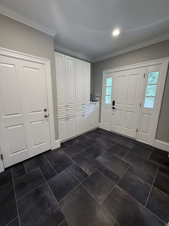 15 Cedar Road Brookline, MA 02467 - Photo 13 of 26 a room with a black white checkered floor storage and utility