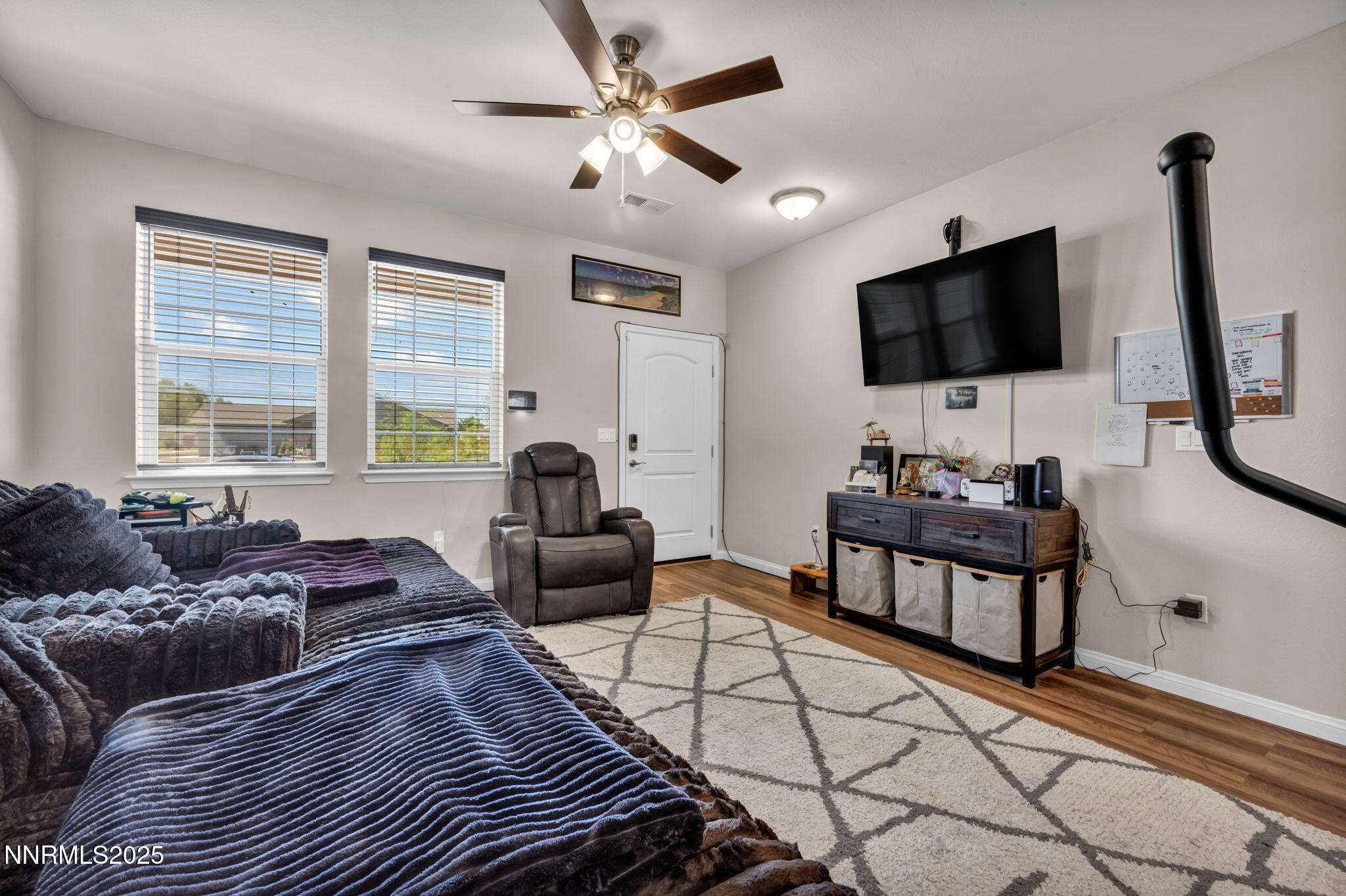 665 Beeghly Drive Fallon, NV 89406 - Photo 12 of 31 a living room with furniture and a flat screen tv