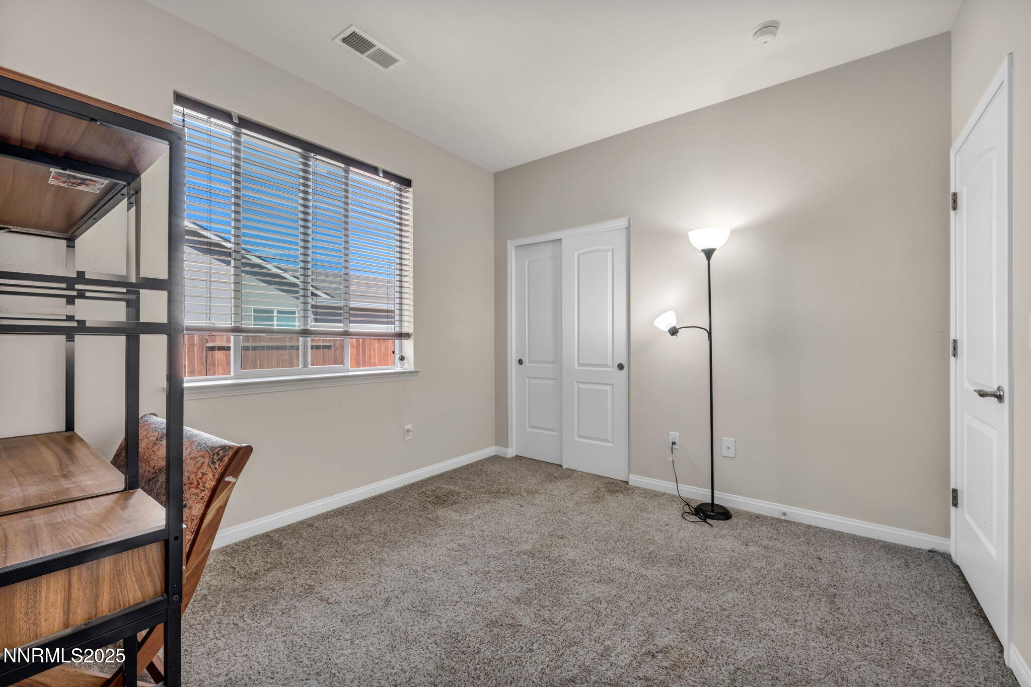 665 Beeghly Drive Fallon, NV 89406 - Photo 15 of 31 a view of an empty room with a window