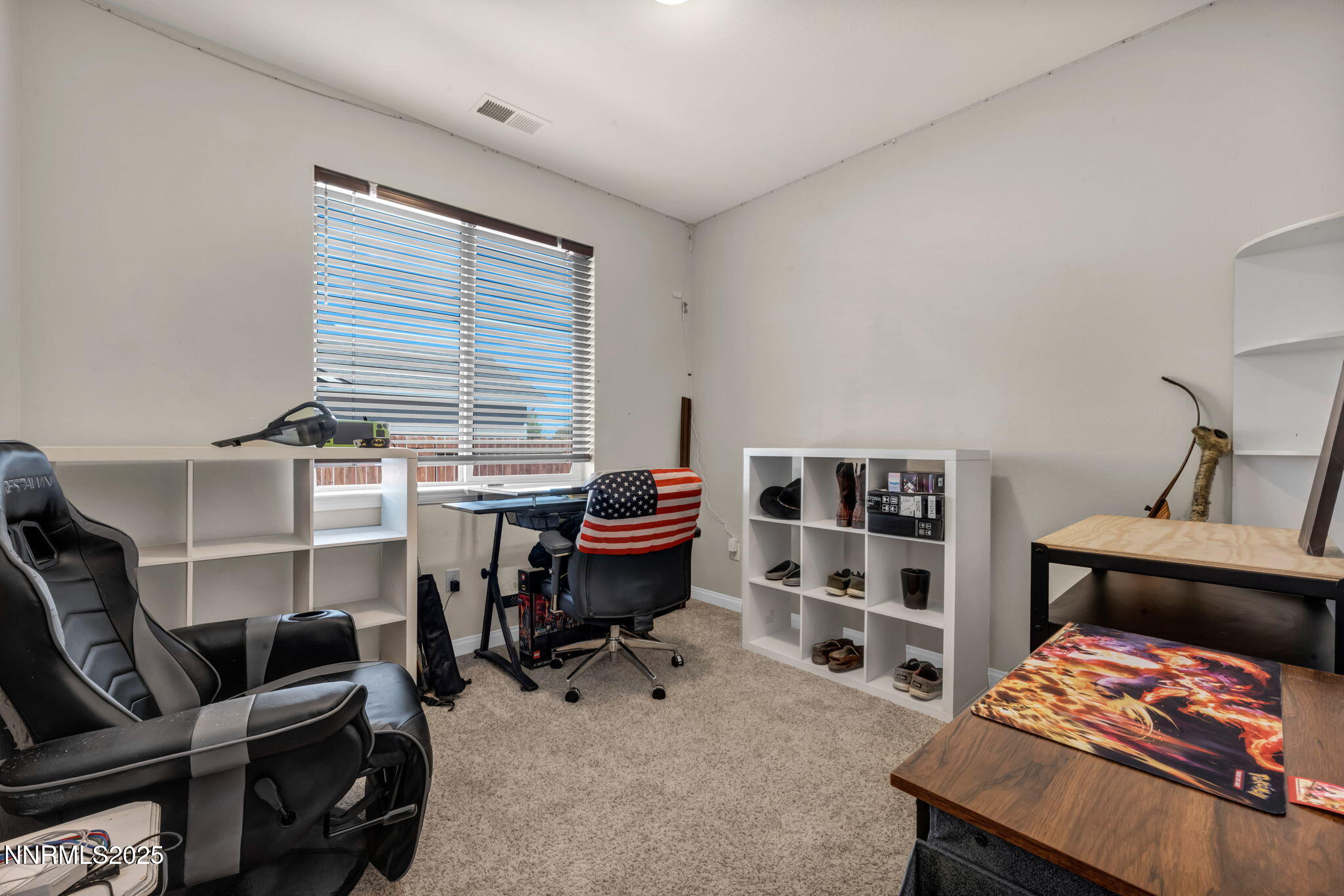 665 Beeghly Drive Fallon, NV 89406 - Photo 16 of 31 a room with furniture and a window