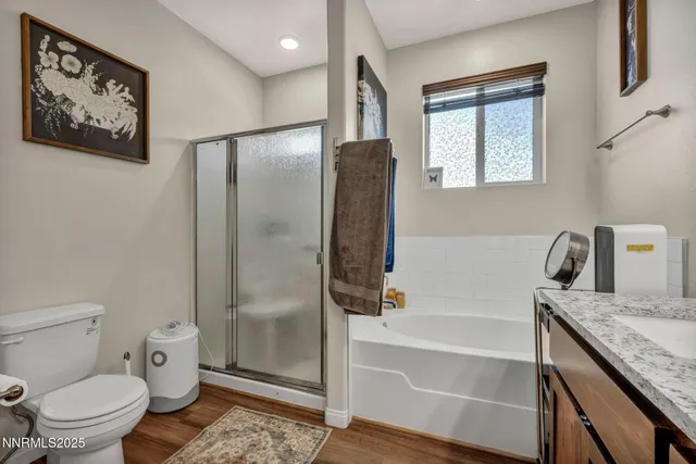 a bathroom with a sink double vanity and a mirror
