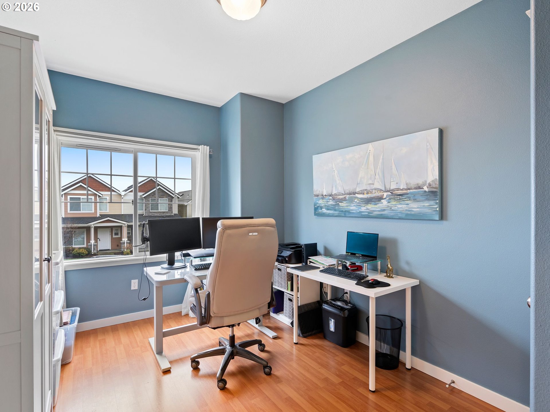 2513 Northwest 3rd Terrace Gresham, OR 97030 - Photo 16 of 38 a workspace with furniture hardwood and a window