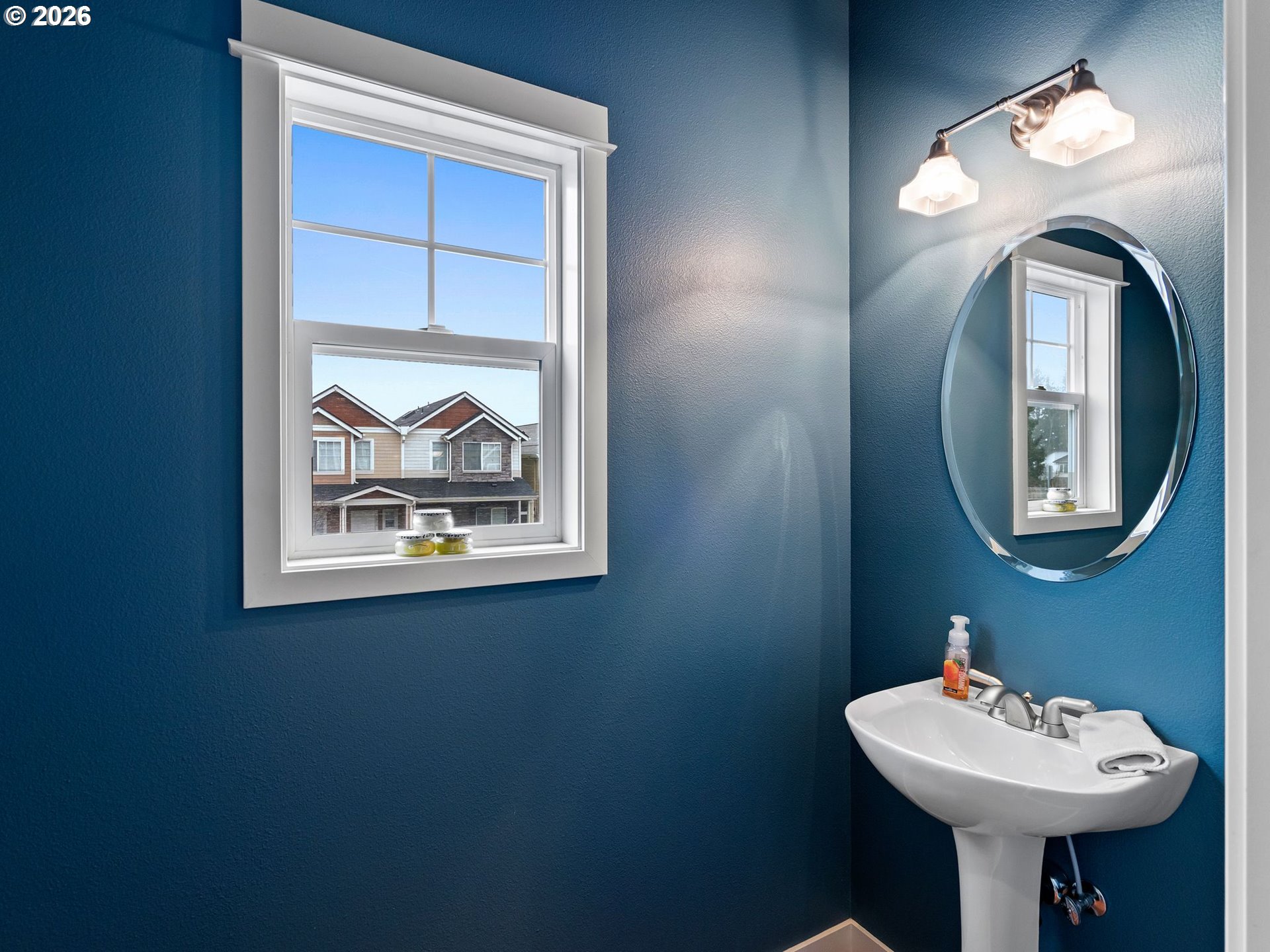 2513 Northwest 3rd Terrace Gresham, OR 97030 - Photo 18 of 38 a bathroom with a sink and a mirror